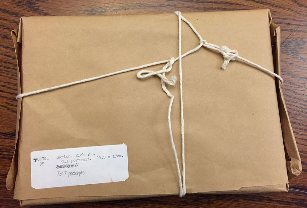 Package wrapped in bown paper and tied with twine