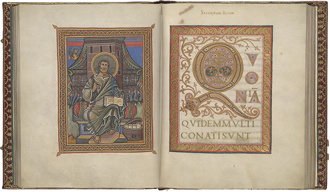 Seated man at left