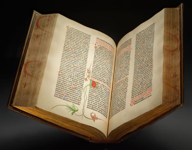 Open book on dark background