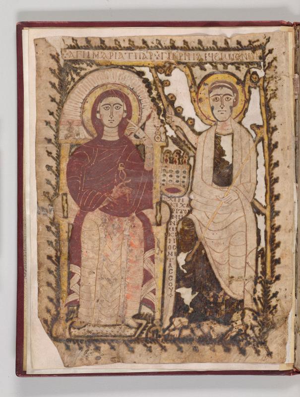 Two seated figures in robes with halos.