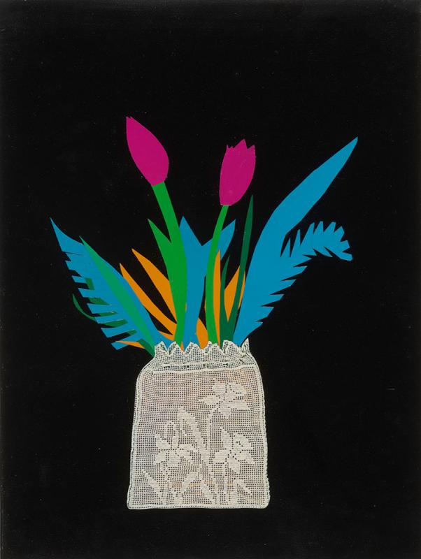 Cut-out pink flowers with blue and green leaves in a gray vase with a blcak background.